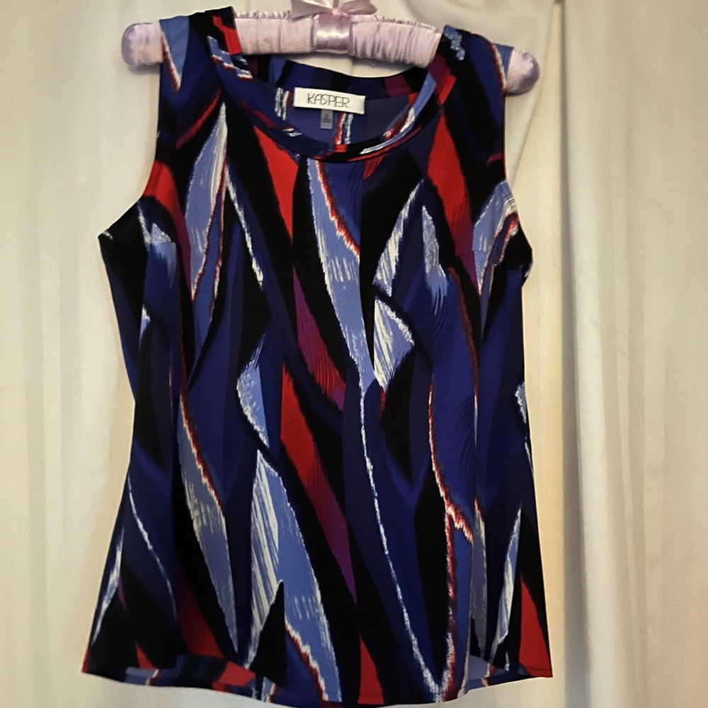 Size Medium tank-like top.  Dressed up for work or with jeans at night.